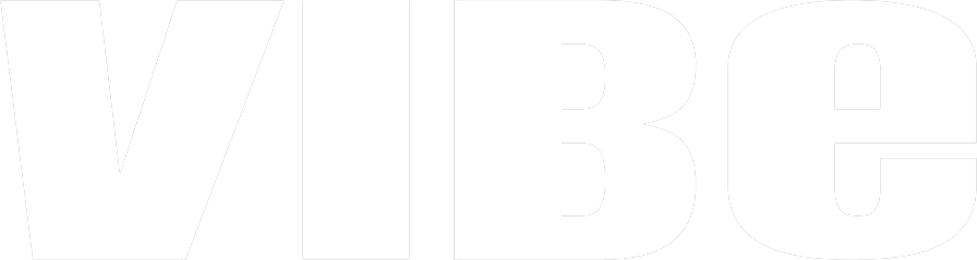 Close-up of the word 'VIBE' in bold, black and white text.