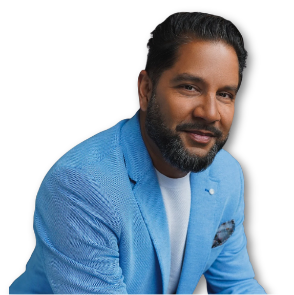 Devo Brown, broadcaster and host, smiling in a studio portrait