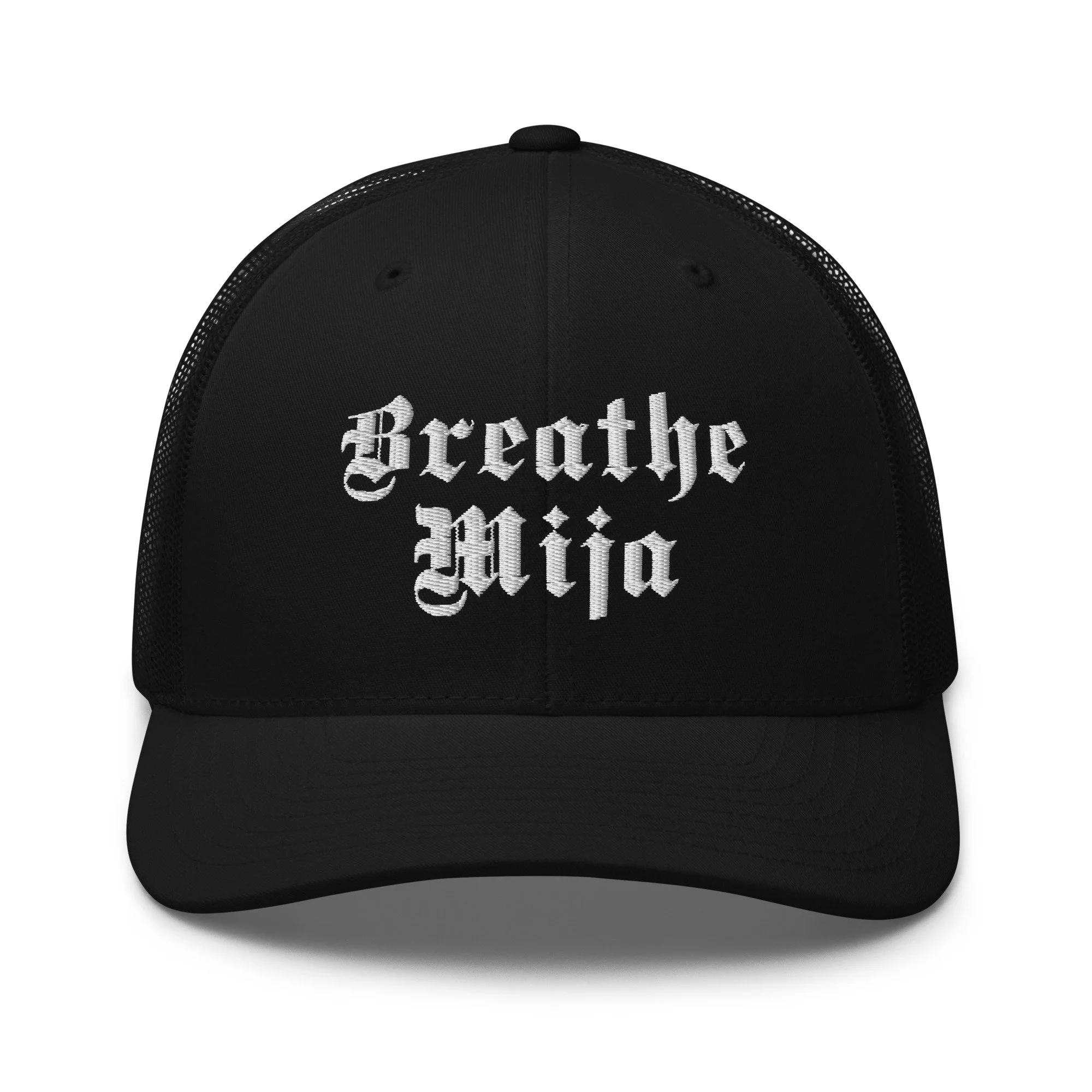 Black trucker hat with white Breathe Mija embroidery in old English lettering