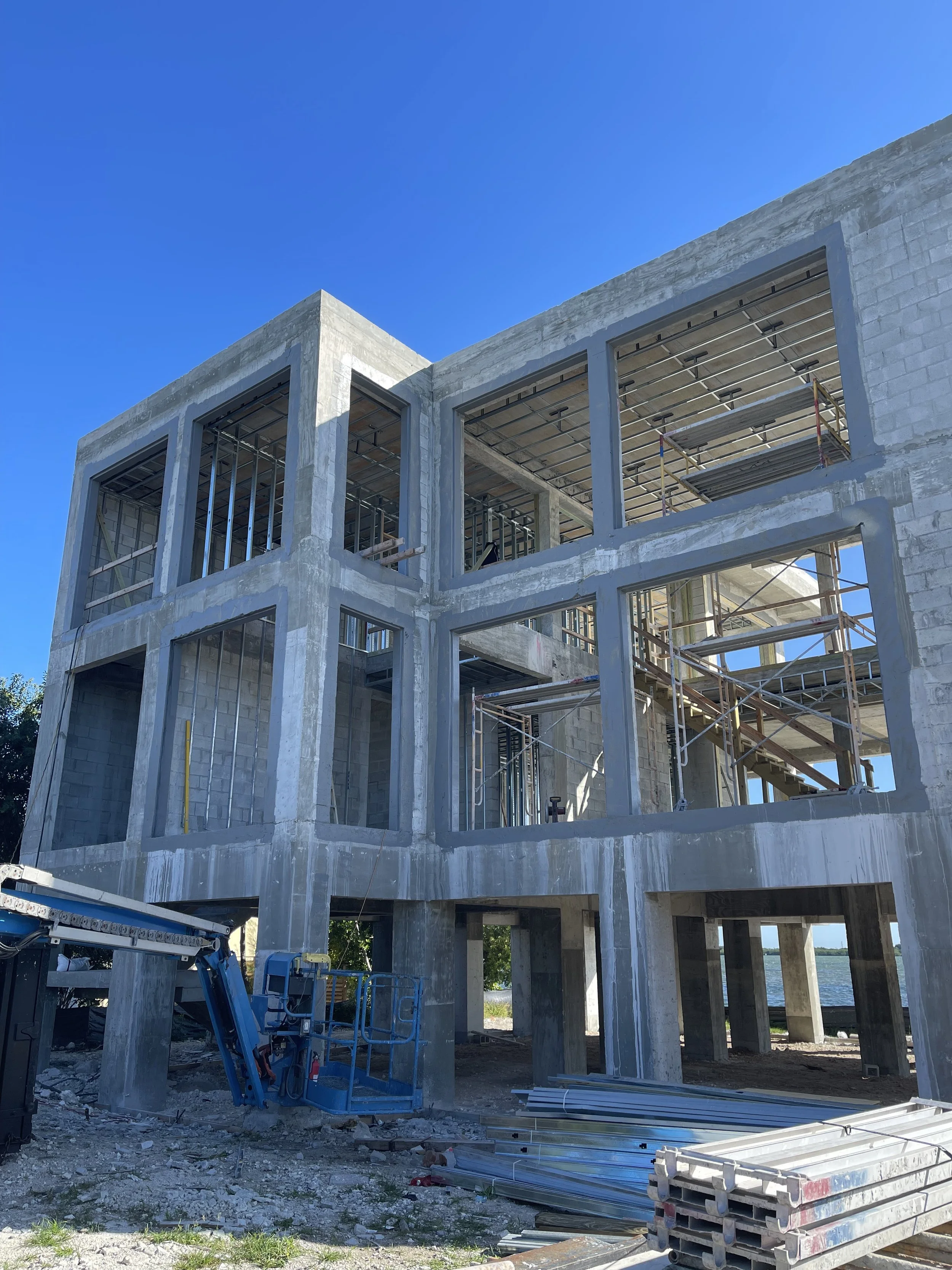 By trades  - Structures, roofing, windows, stucco, site work, flooring, tile.