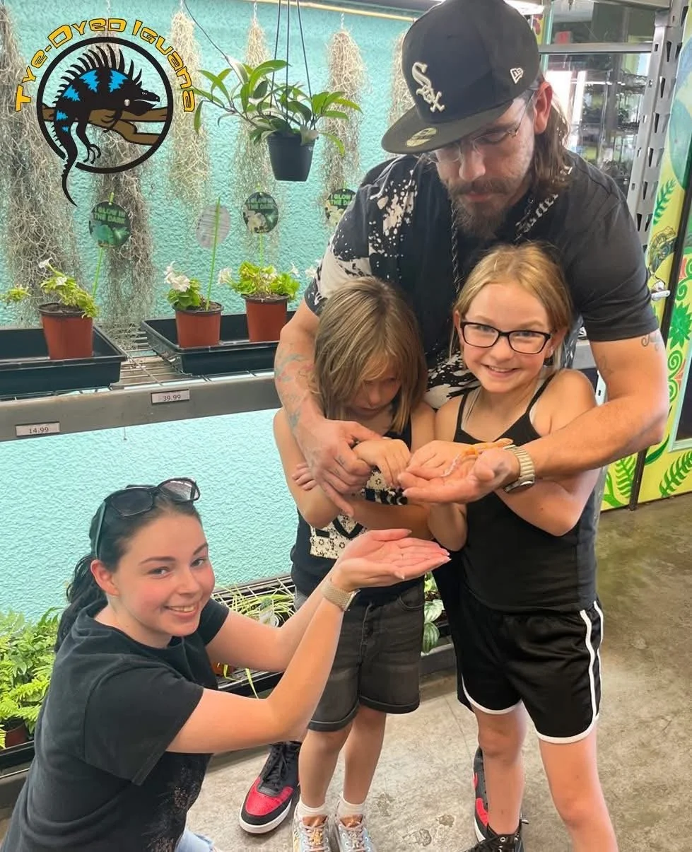 Our little family welcoming our daughter's newest pet!