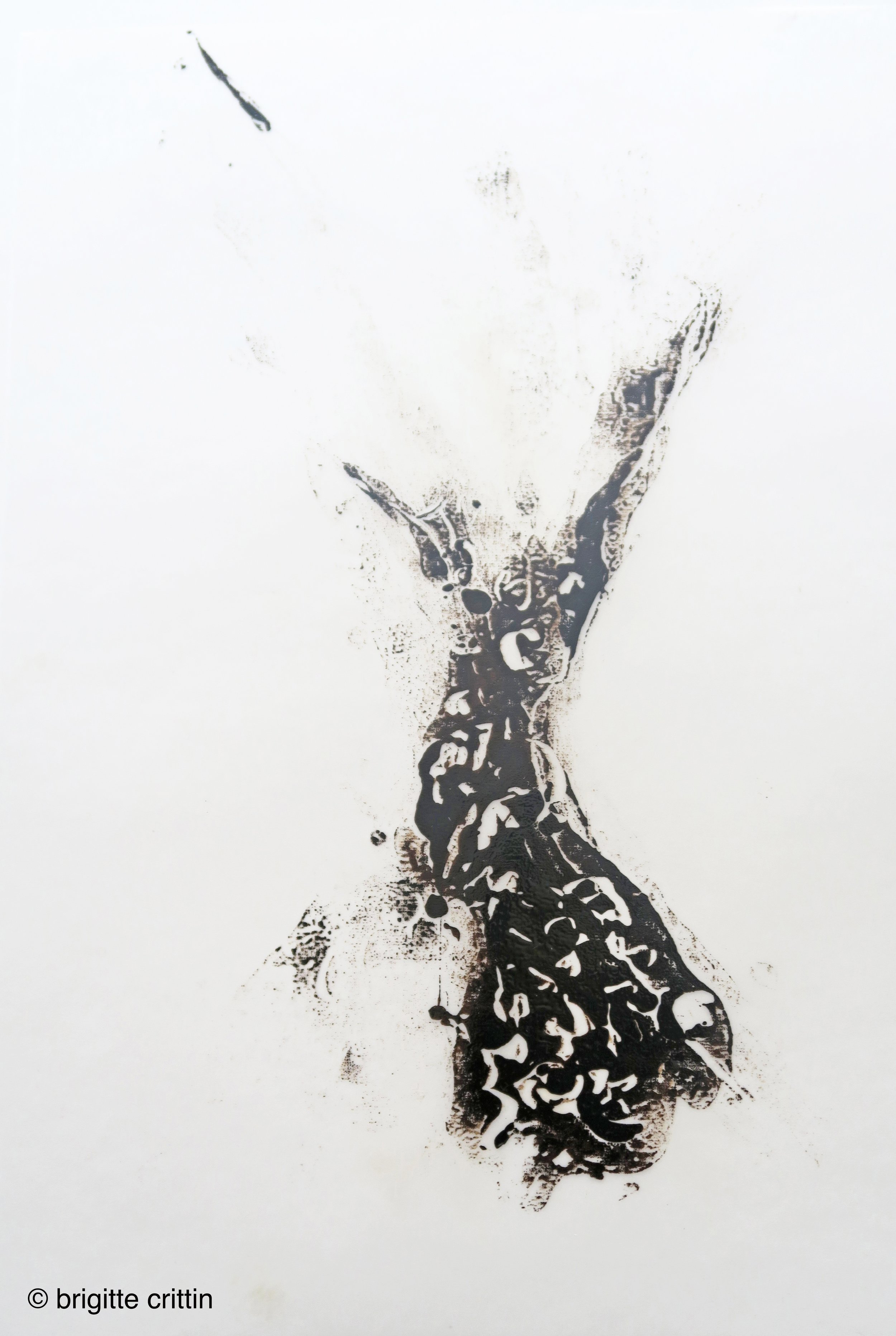 Inkblot-style artwork resembling a giraffe on a white background.