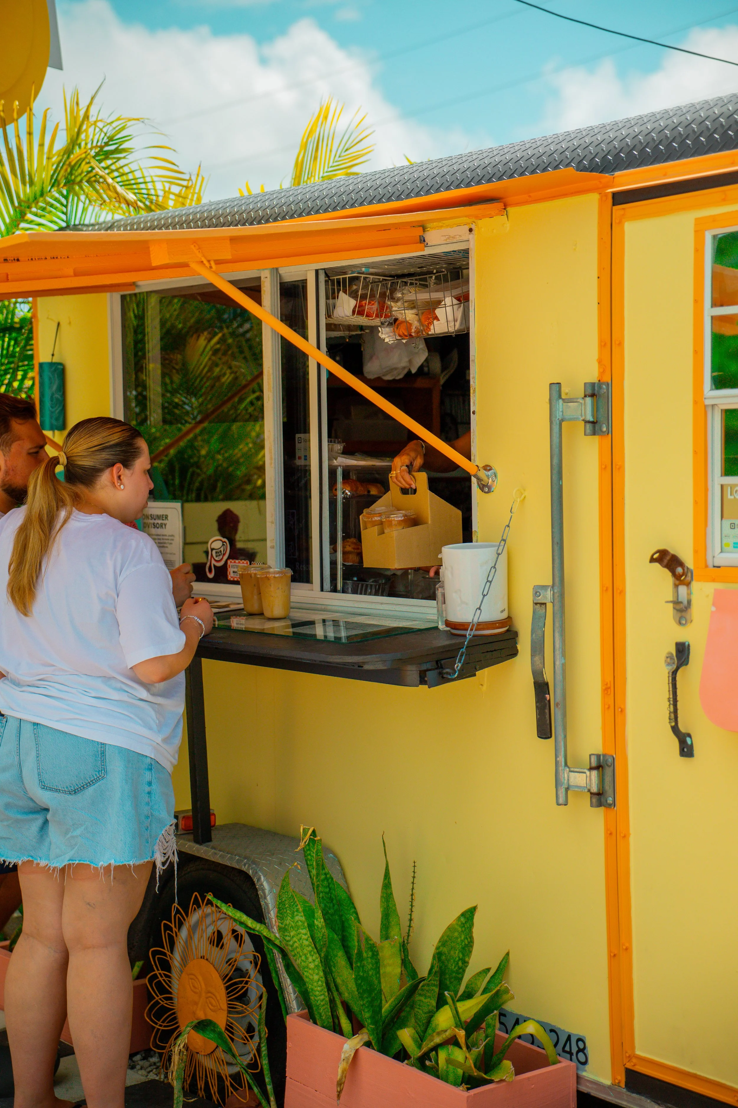 Customers ordering at Mugshot Coffee Co