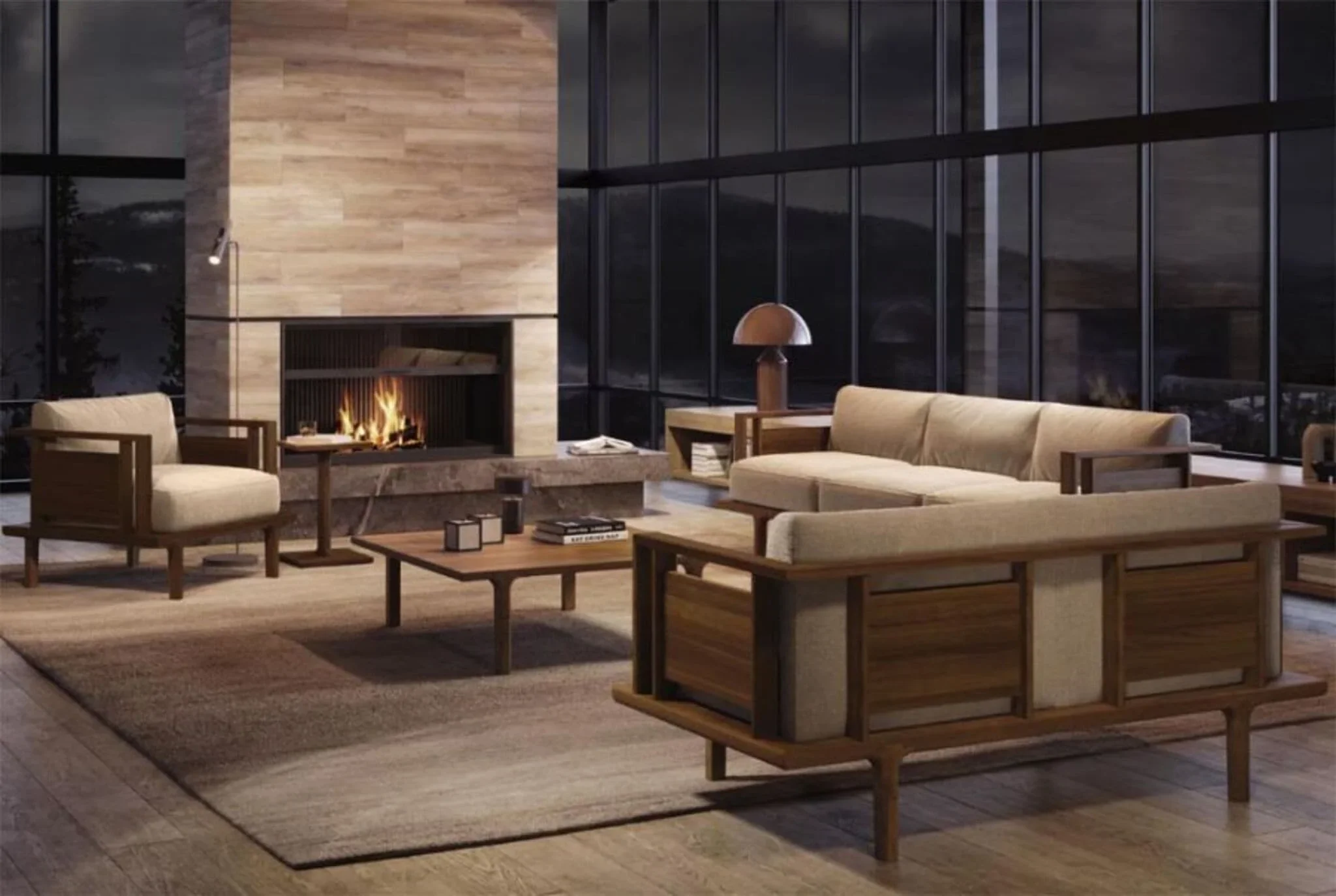 Modern living room with beige Copeland furniture sofas, wooden accent furniture, a fireplace, and large floor-to-ceiling windows showing a night view outside.