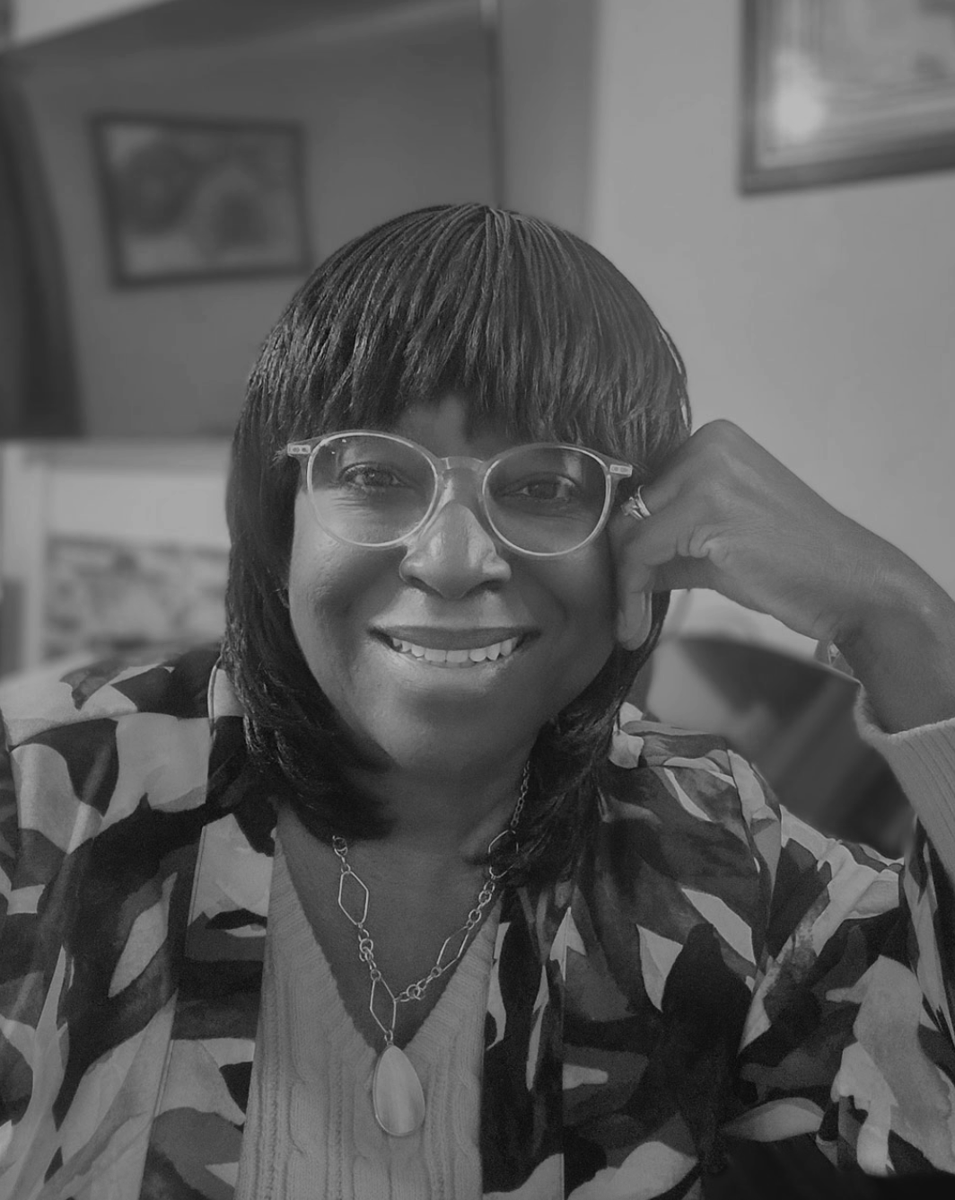 woman with glasses posing