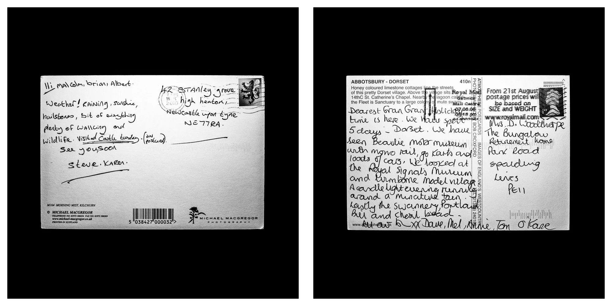 A forensic photographic capture displaying the reverse sides of two historical postcards positioned side-by-side against an absolute black space. Part of a systematic cataloging protocol, the image isolates the artifacts to treat handwriting, postal 