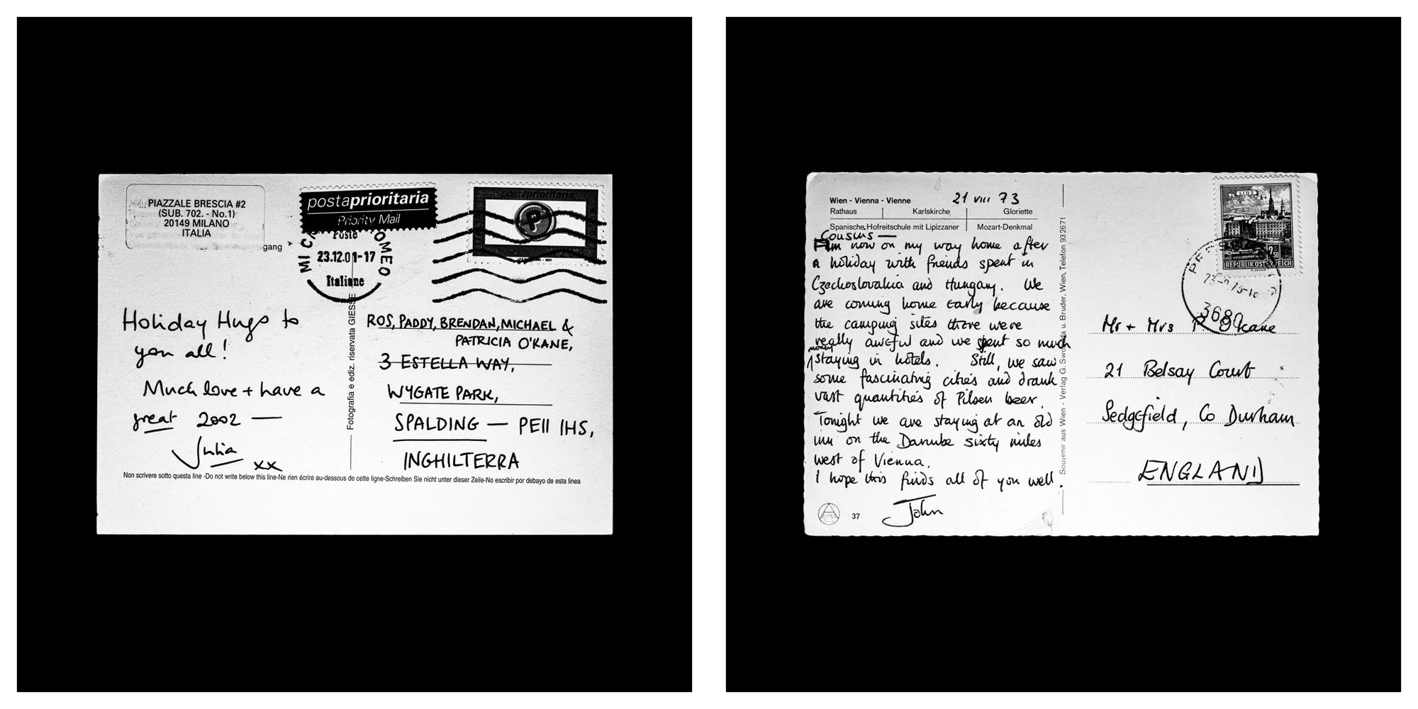 A forensic photographic capture displaying the reverse sides of two historical postcards positioned side-by-side against an absolute black space. Part of a systematic cataloging protocol, the image isolates the artifacts to treat handwriting, postal 
