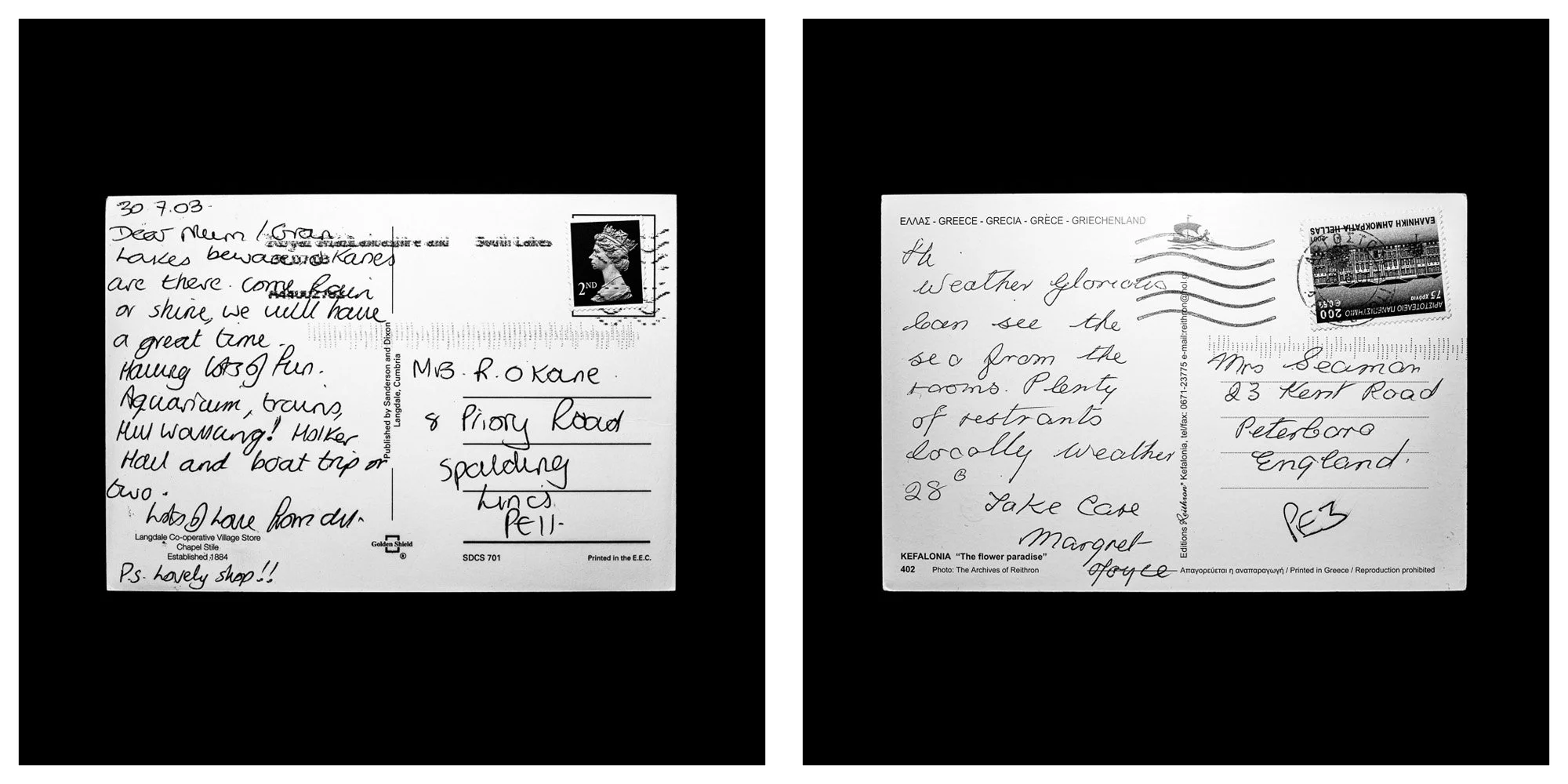 A forensic photographic capture displaying the reverse sides of two historical postcards positioned side-by-side against an absolute black space. Part of a systematic cataloging protocol, the image isolates the artifacts to treat handwriting, postal 