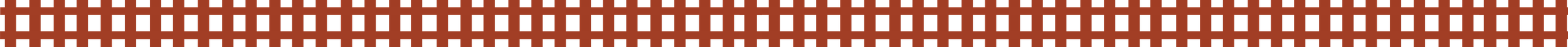 Close-up of a red and black patterned fabric or surface with a grid design.