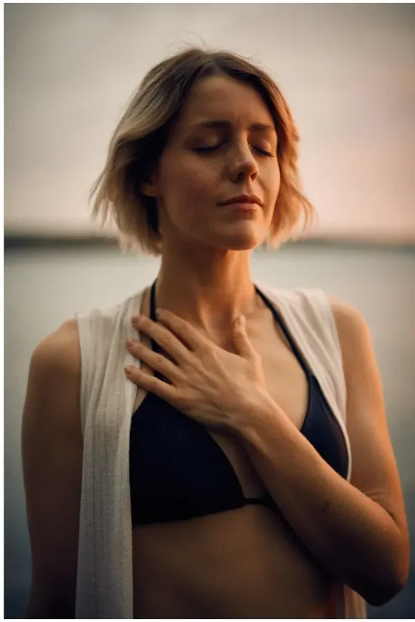 Woman with short blonde hair by the watch utilizing learned skills to regulate nervous system in therapy with Amy Ros