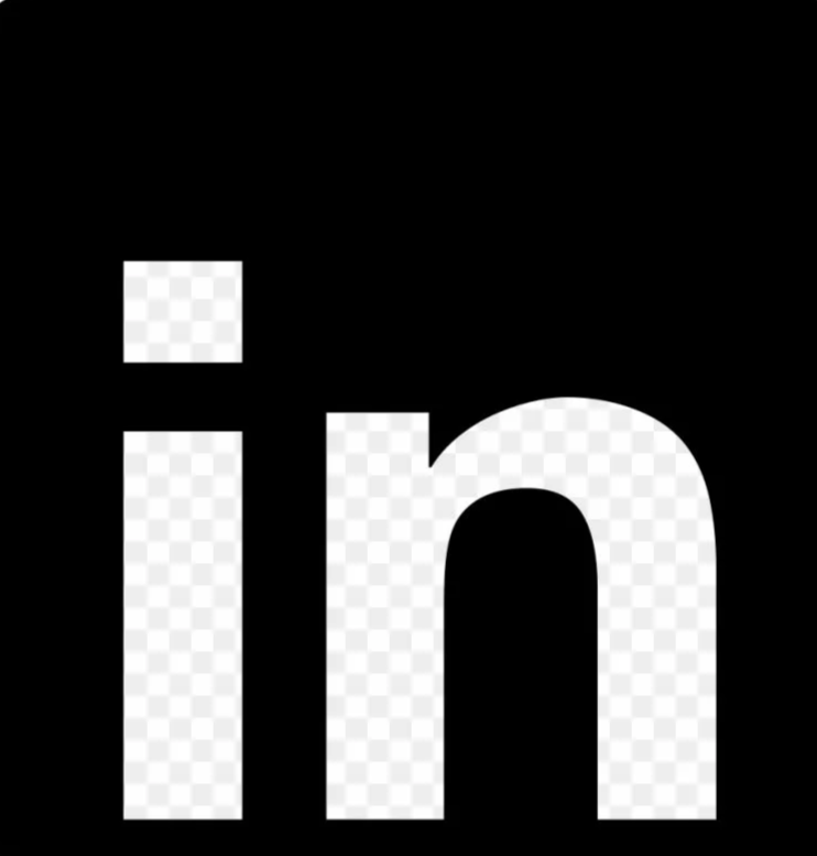 Close-up of a black sign with large white letters spelling 'in'.