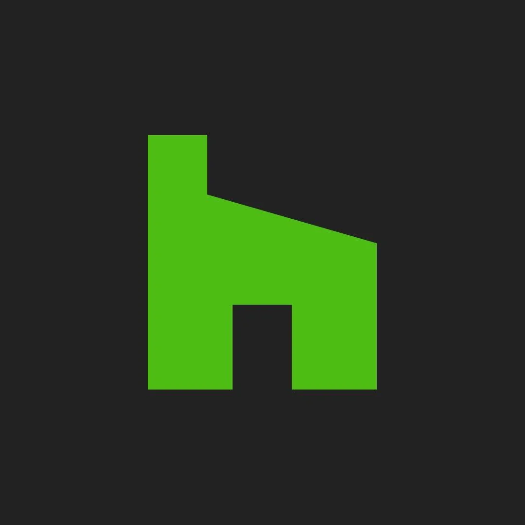 A black background with a green house icon in the center.