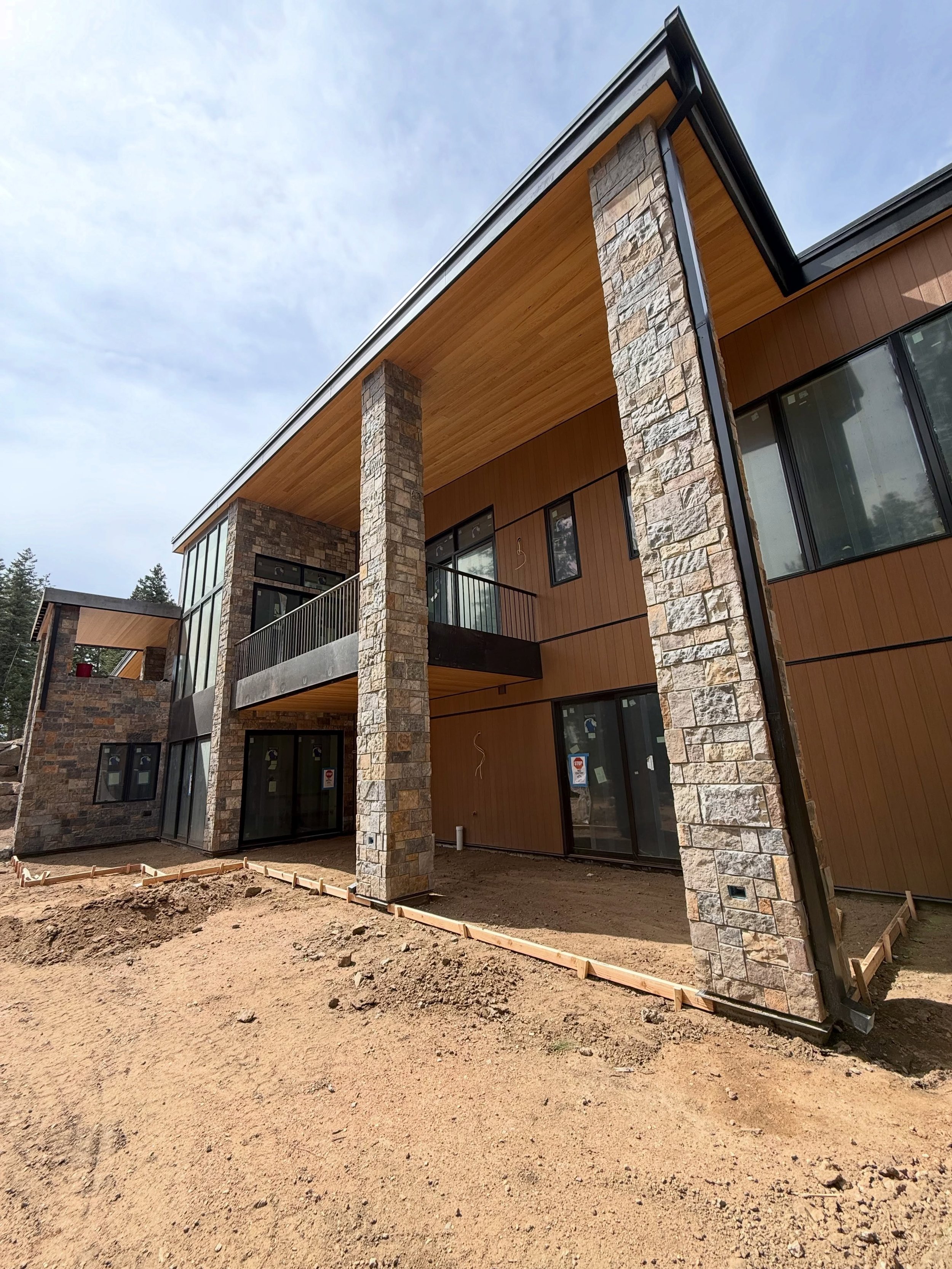 Casa Madrid is nearing completion! Flatwork prep in progress, final carpentry and finishes inside. Here come the painters!! #architecture #build #luxuryhomes #heart
