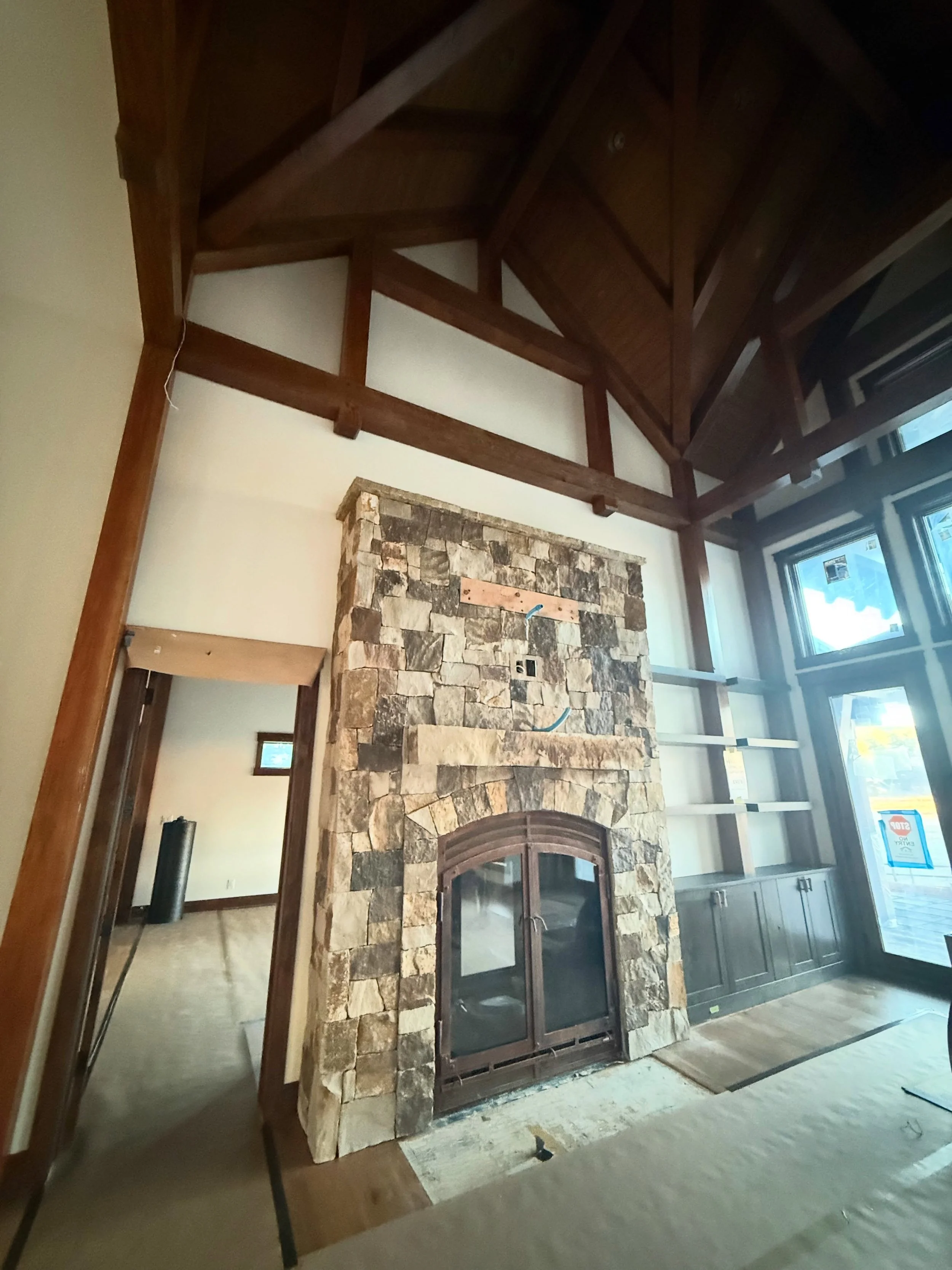 There&rsquo;s something special about a fireplace that becomes the heart of not just one room, but two.

In this Colorado Timberframe home, this incredible double-sided fireplace creates a dramatic focal point for both the great room and the primary 