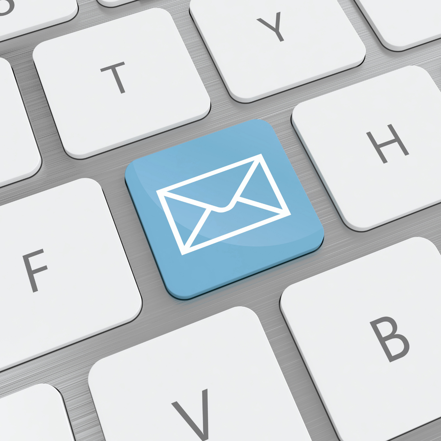 Computer keyboard with a blue email icon key surrounded by white letter keys.