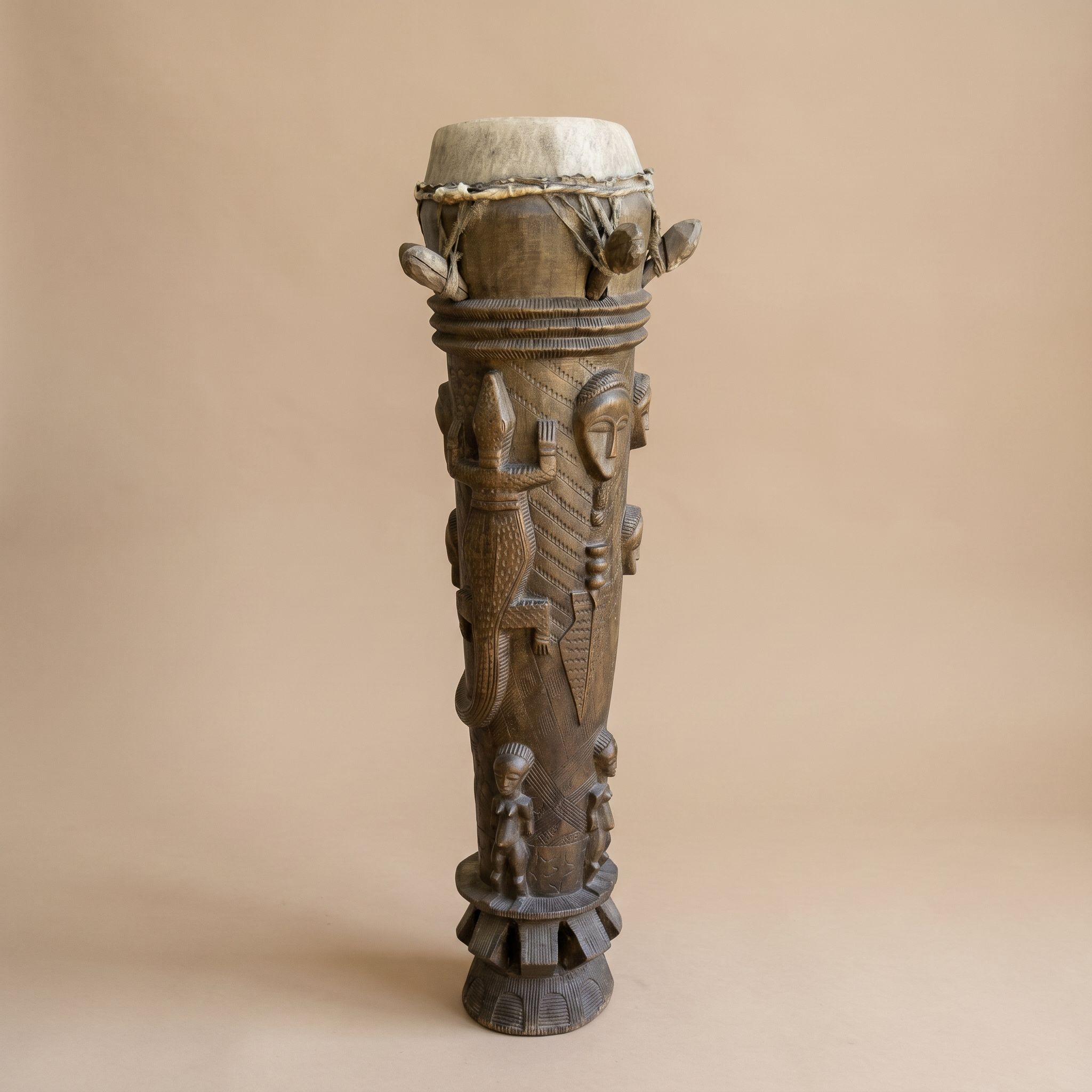 LARGE CARVED AFRICAN DRUM SCULPTURE – FIGURAL, 53” TALL