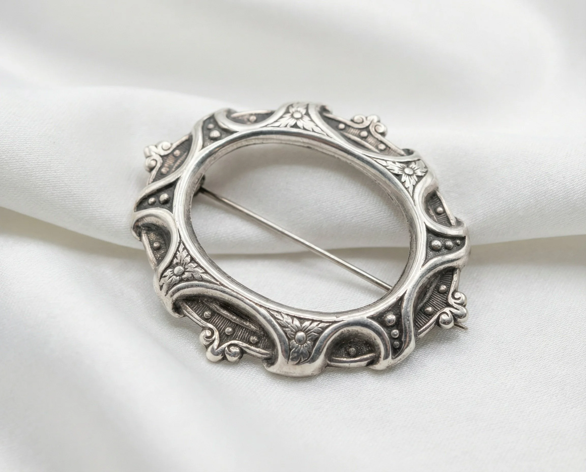 Ornate Silver Frame Brooch
