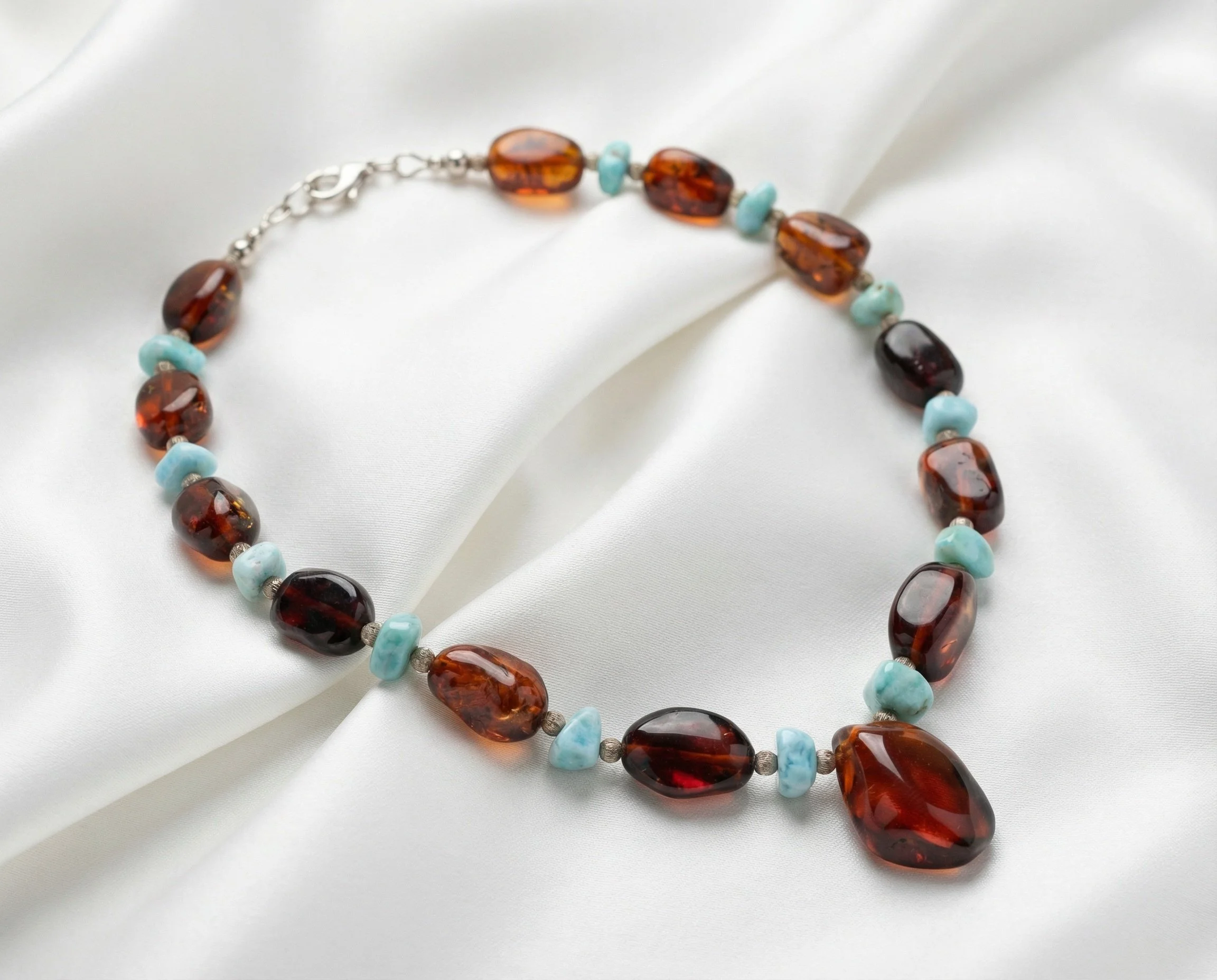 Amber and turquoise with Sterling Silver.