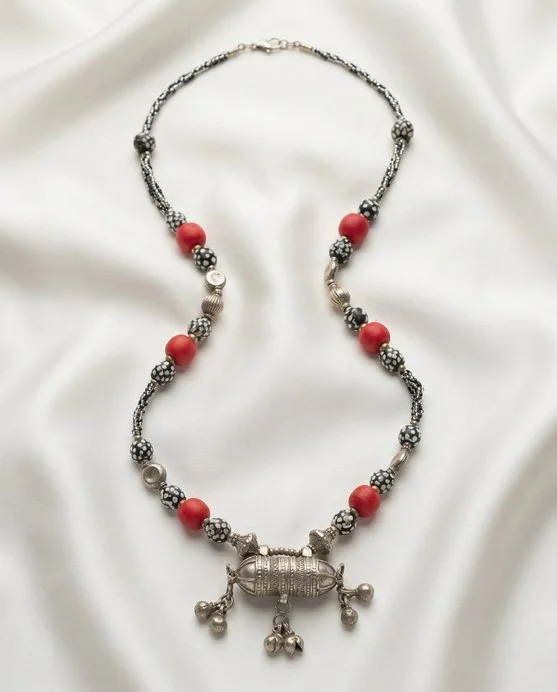 Silver ethnic Necklace with Central Pendant and Decorative Beads