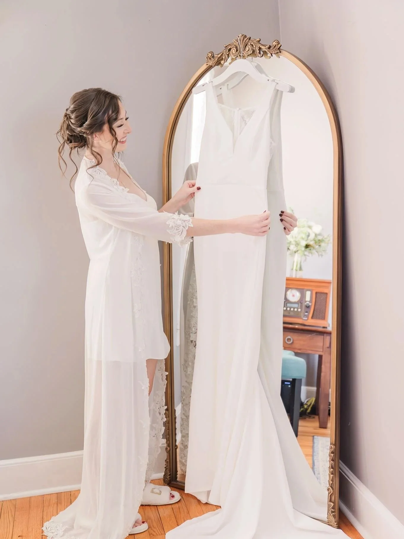 A bride getting ready in our on-site farmhouse accommodations at Sable and Vine, a beautiful and classy wedding venue close to the NC triangle 