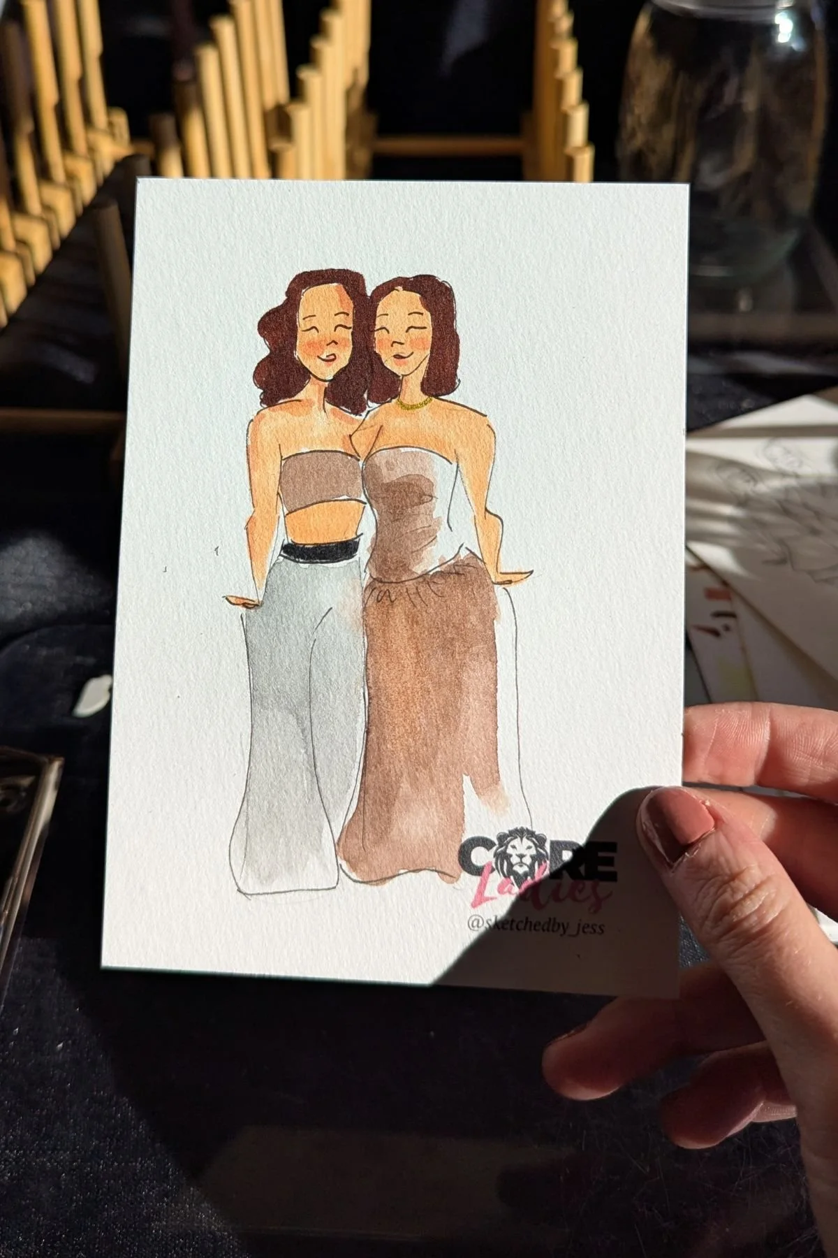 Image depicts a portrait of two women