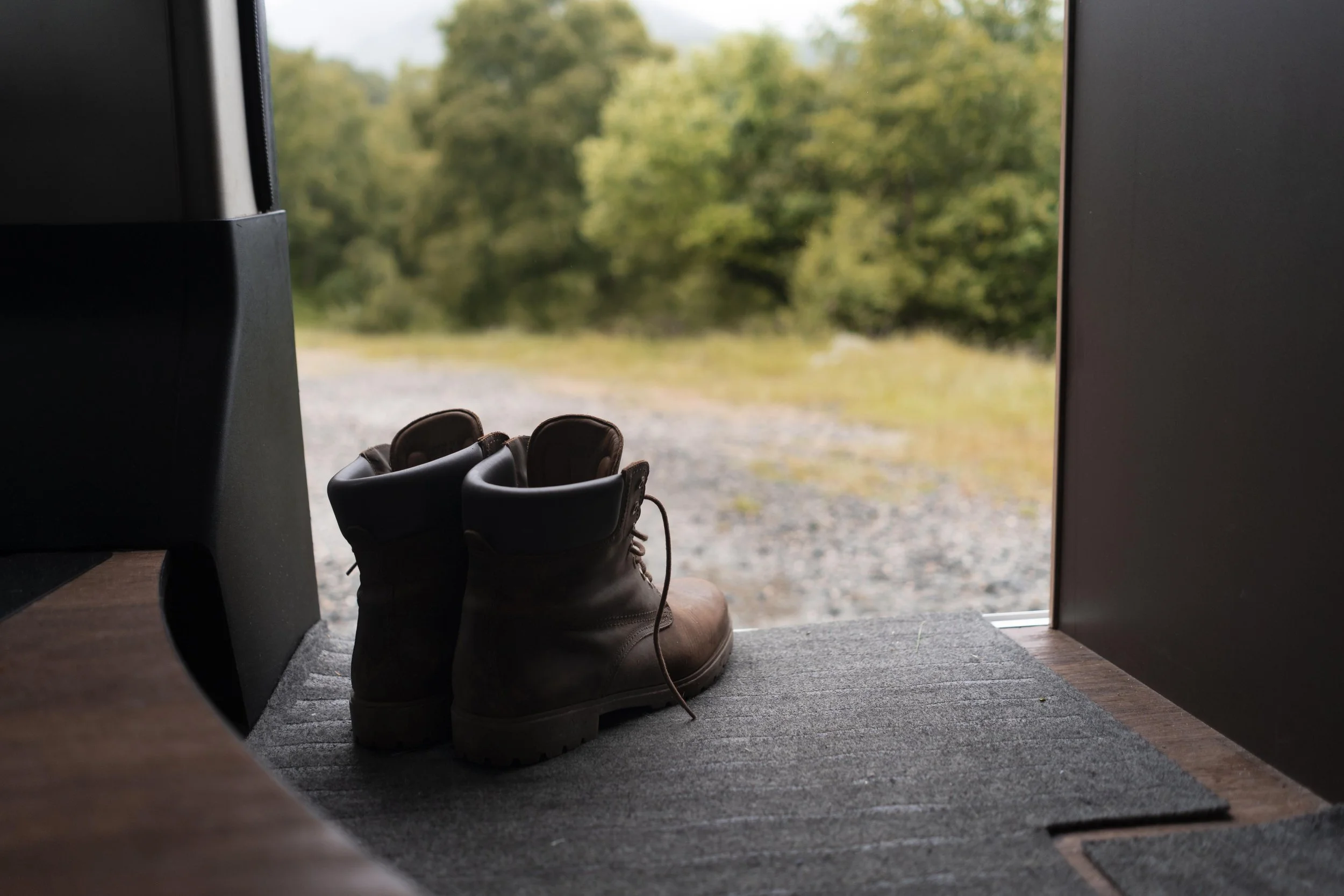 camping boots in the doorway