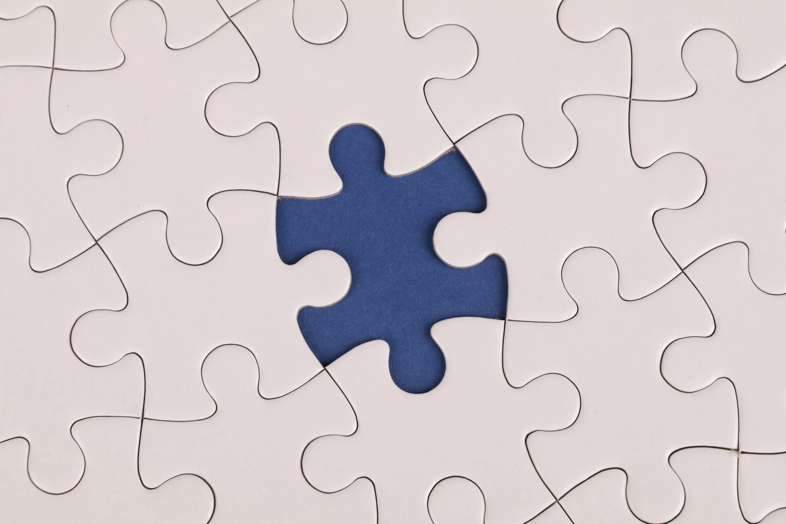 a puzzle missing a piece in the center