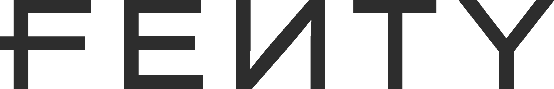 Close-up of black letters spelling out the word 'FETY' on a black background.