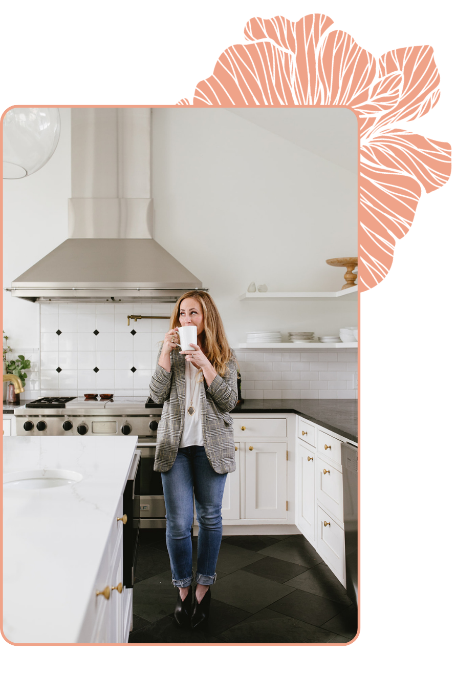 Tara drinking coffee, a Seattle real estate agent in bright modern kitchen holding coffee, wearing plaid blazer, lifestyle branding photo in natural light home setting
