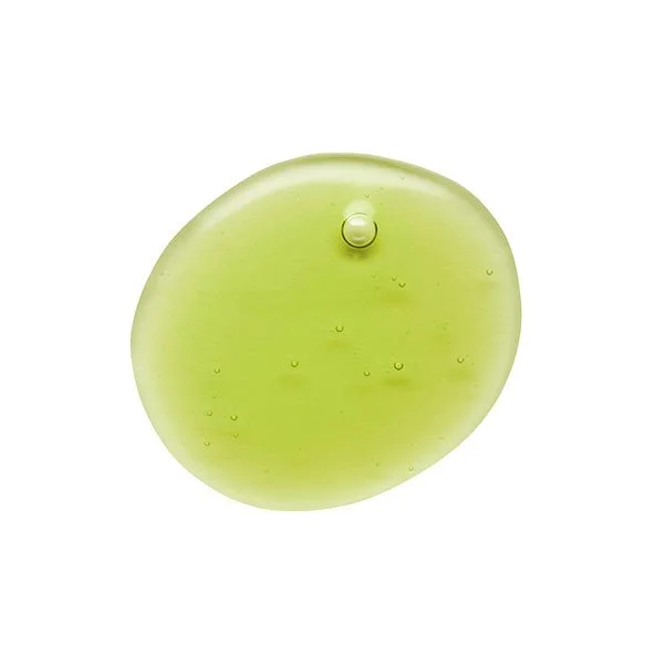 Close up of a drop of tamanu oil