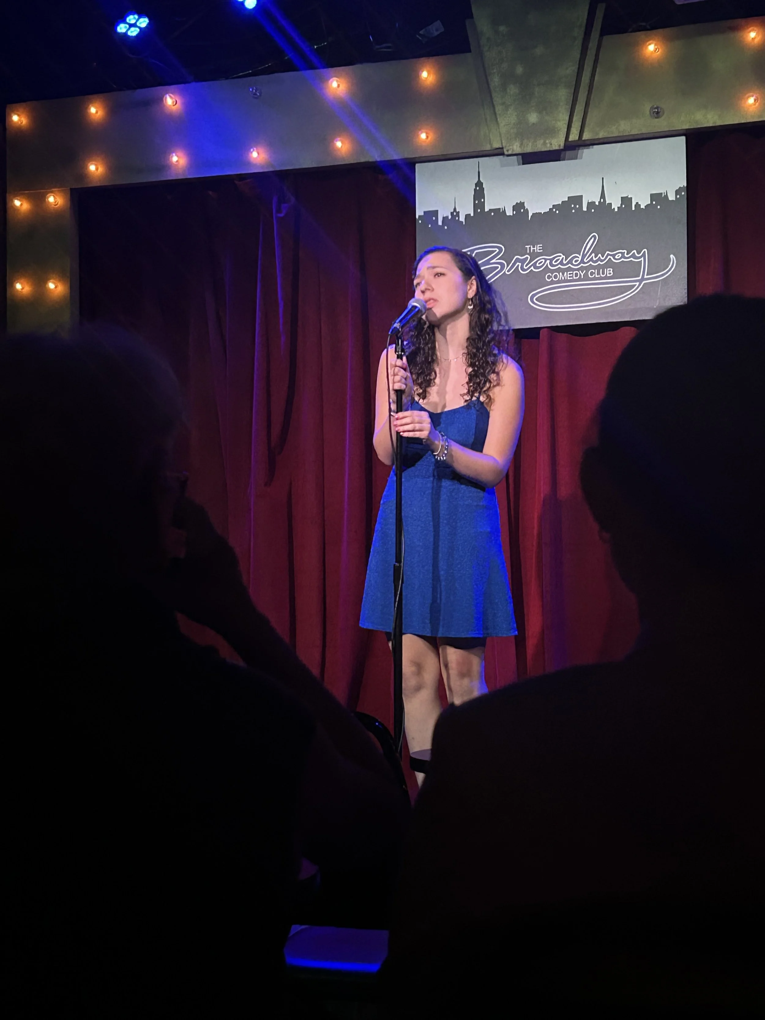 Rebecca performs at "On the Spot," a musical improv show.