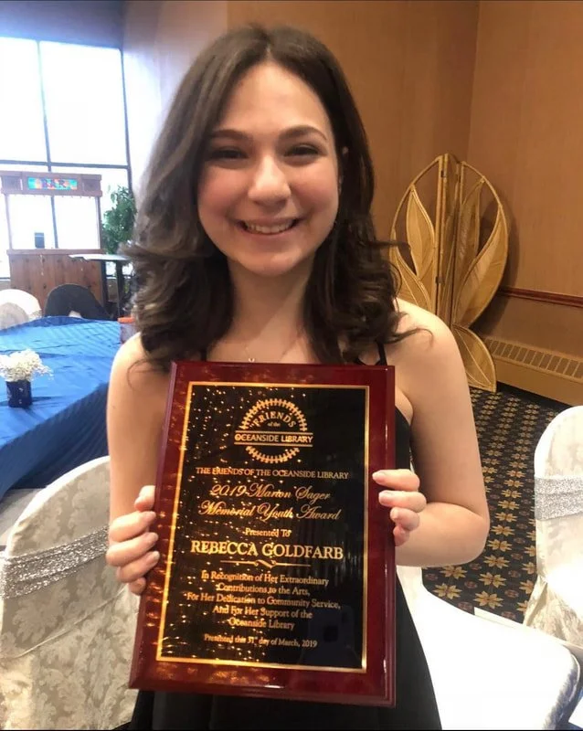 Rebecca receives the Marion Sager Youth Memorial Award.