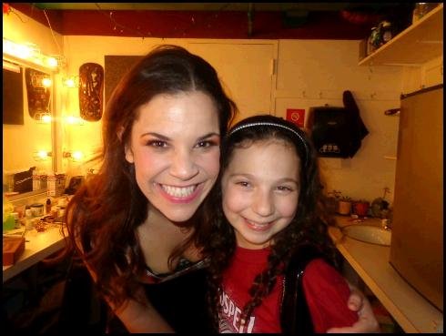 Rebecca as Young Lindsay Mendez in the "Godspell Cast of 2032" on Broadway.