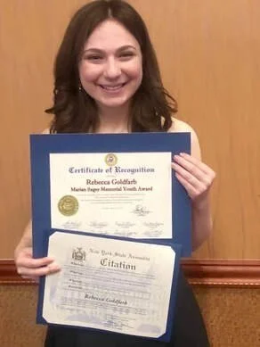 Rebecca receives the Marion Sager Youth Memorial Award.
