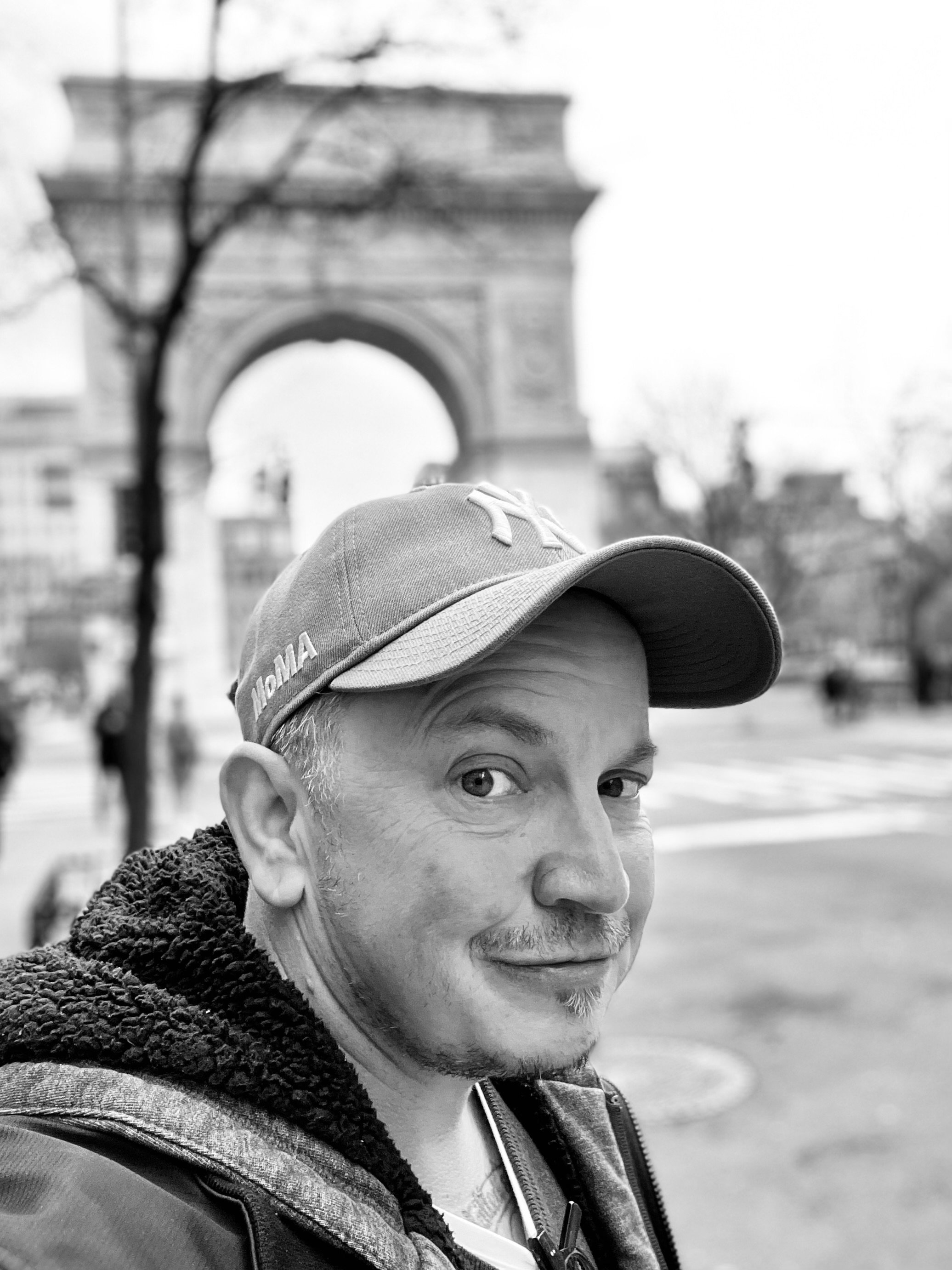 Nik Goodyear beneath Washington Square Arch, black and white