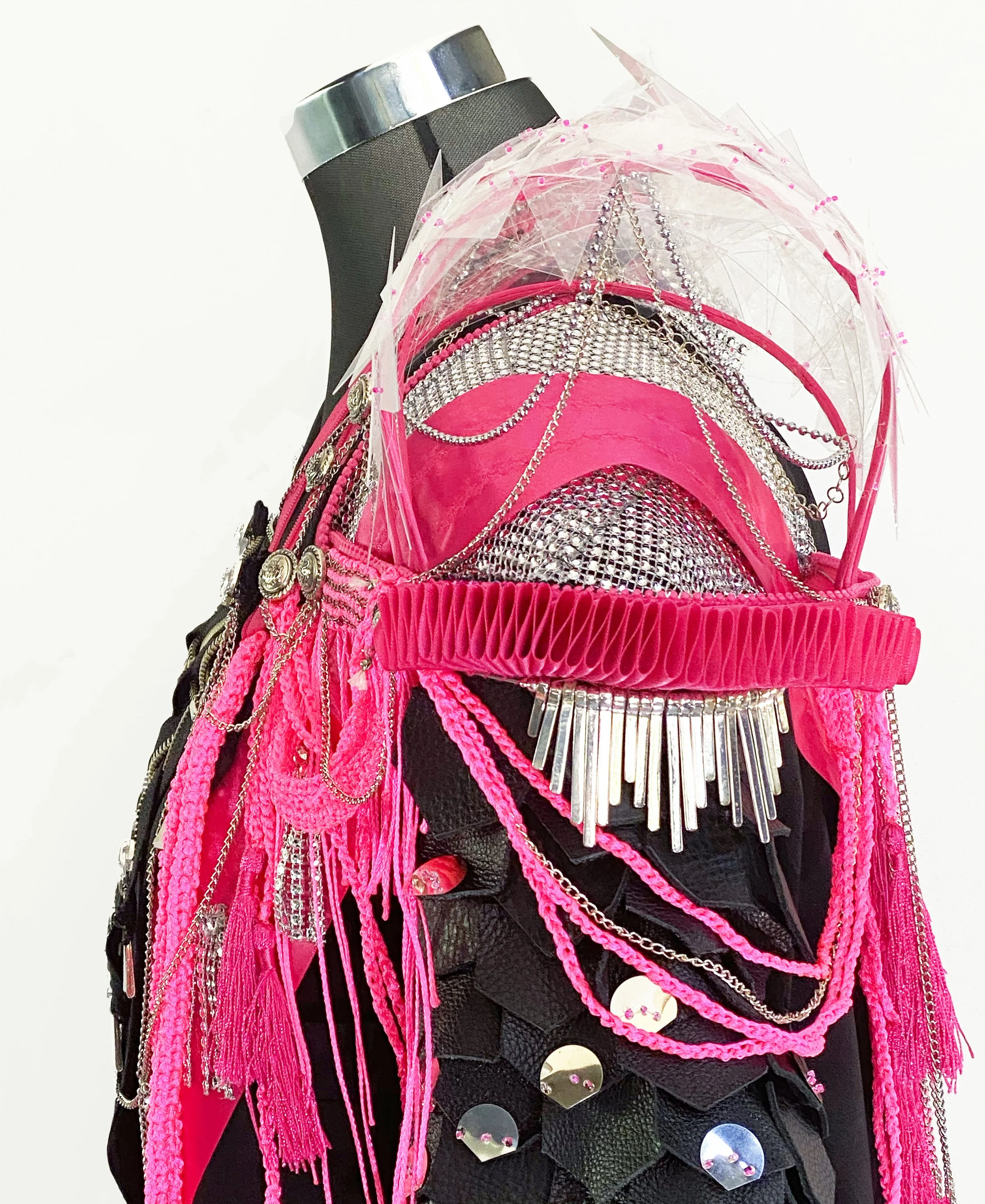 A recontextualised $1 suit explores the shifting boundaries of gender, roles and expectations.  Detailed view of the artwork.