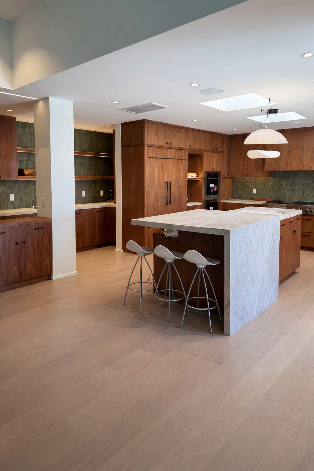 Modern kitchen with marble island.png