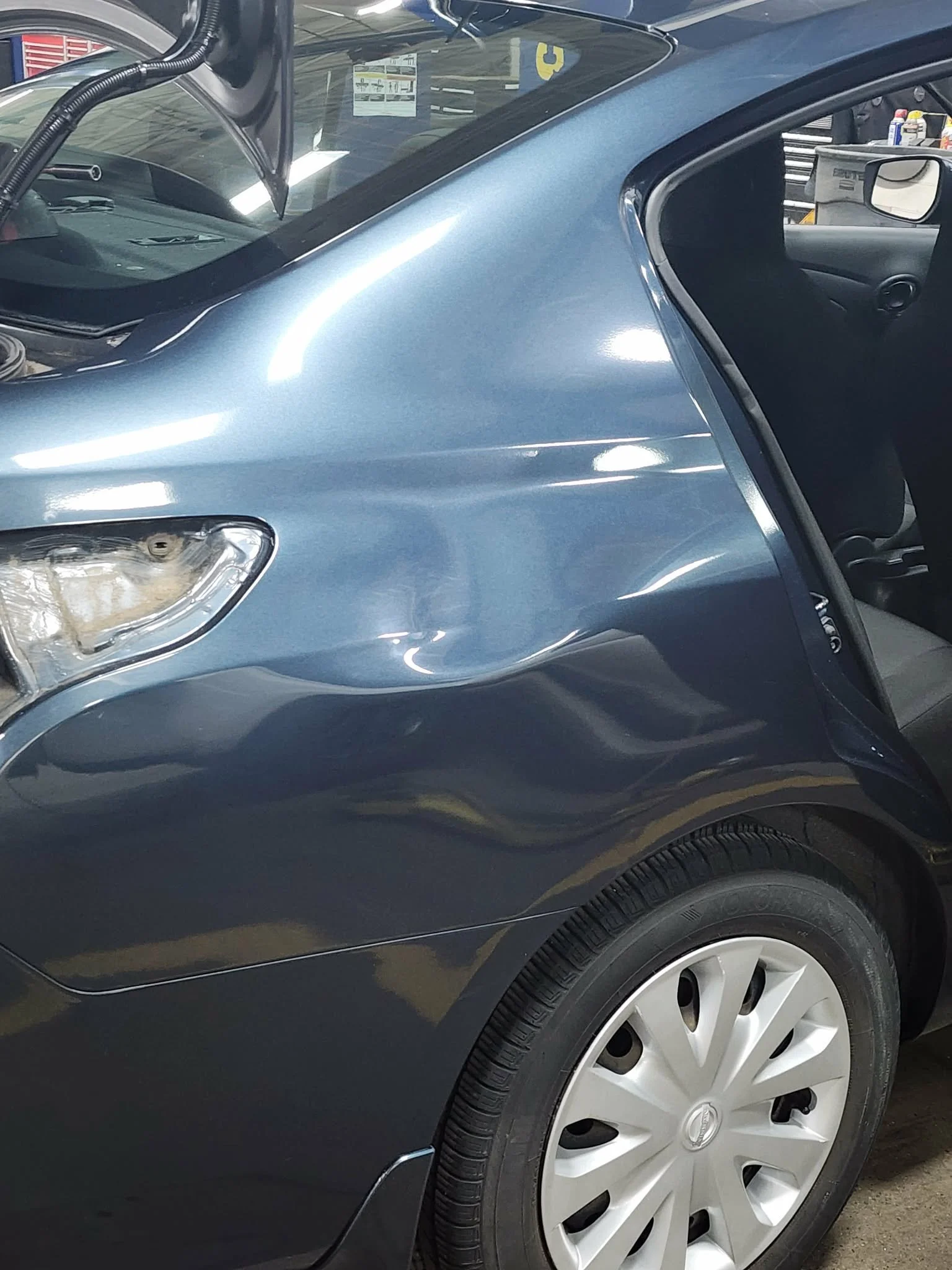 Right Quarter Panel Large Dent, Huge sharp Crwn
