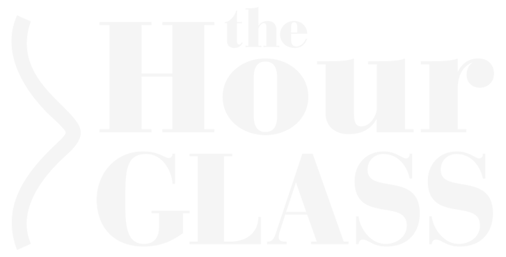 Text graphic reading 'the Hour Glass' with stylized 'H' and 'G' in large font.