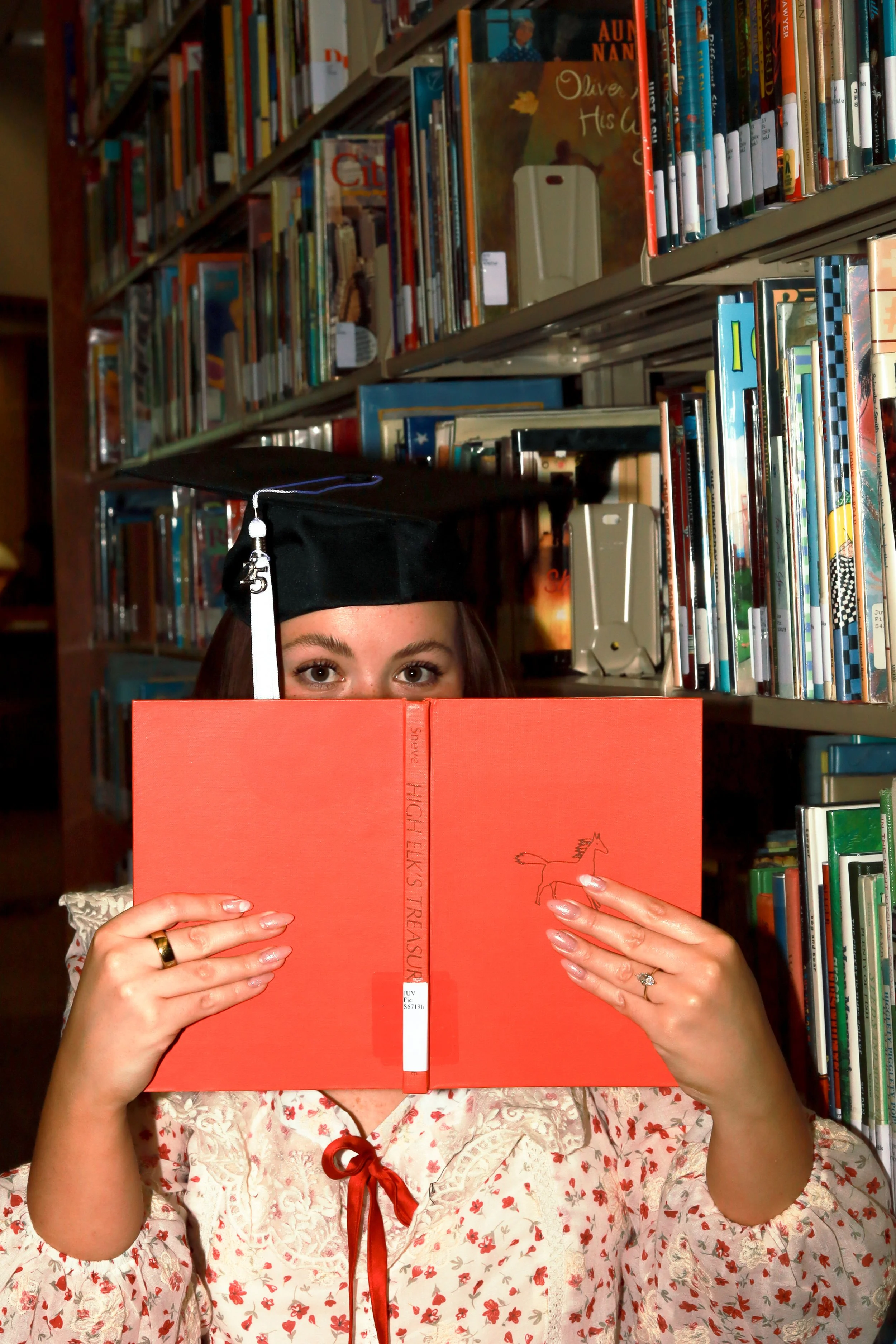 Amanda Lowry Wiberg reading in a library