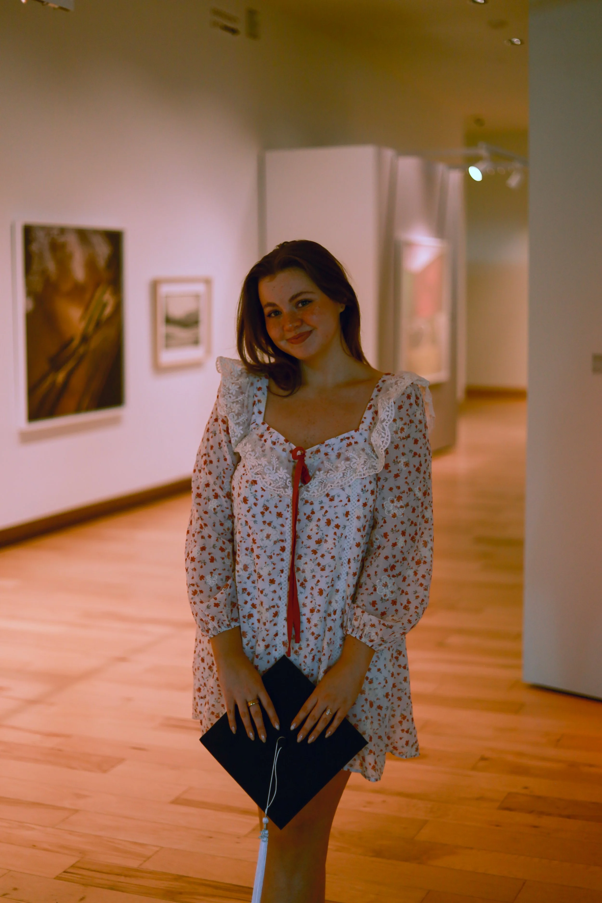Amanda Lowry Wiberg standing in an art museum