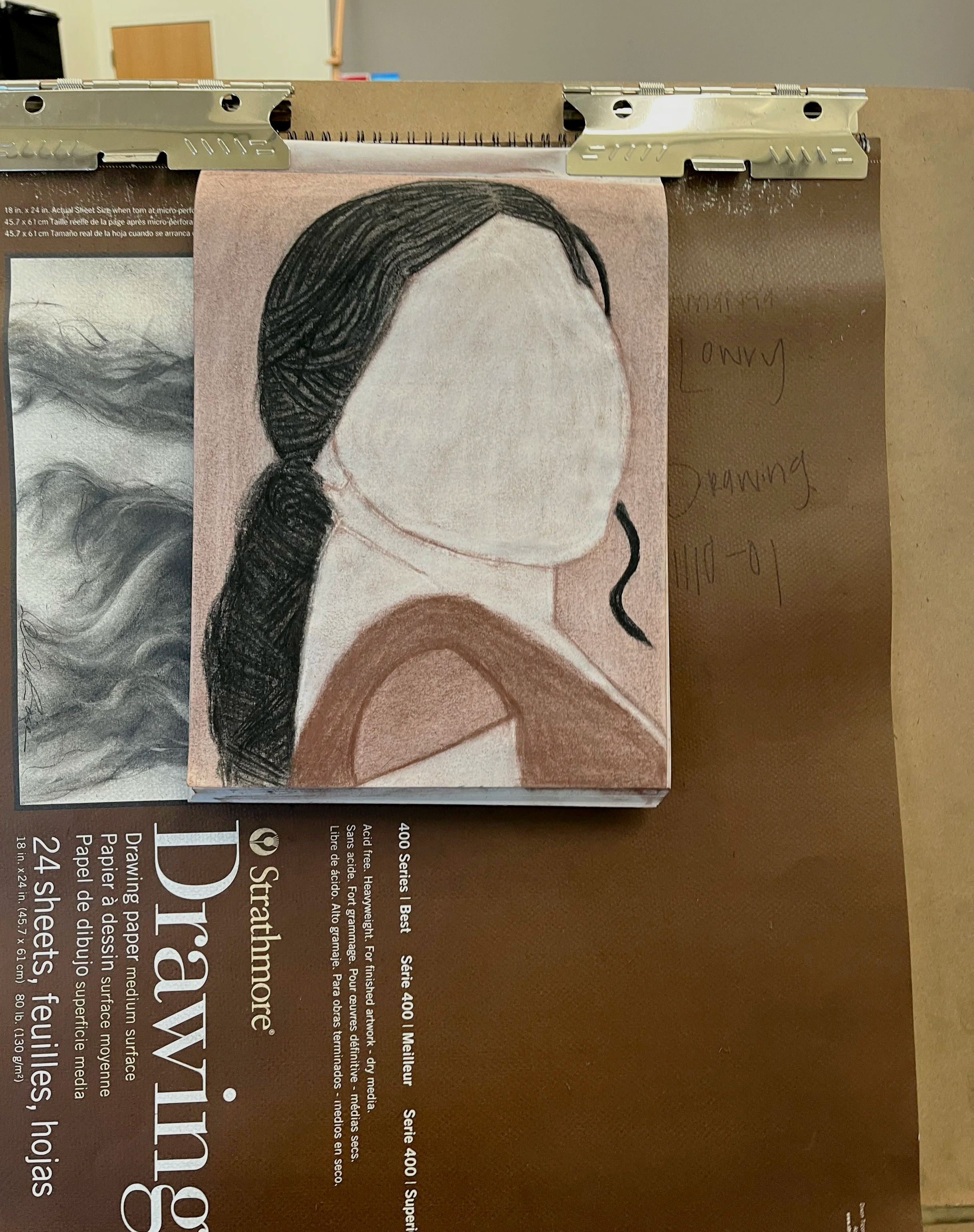 An unfinished charcoal portrait