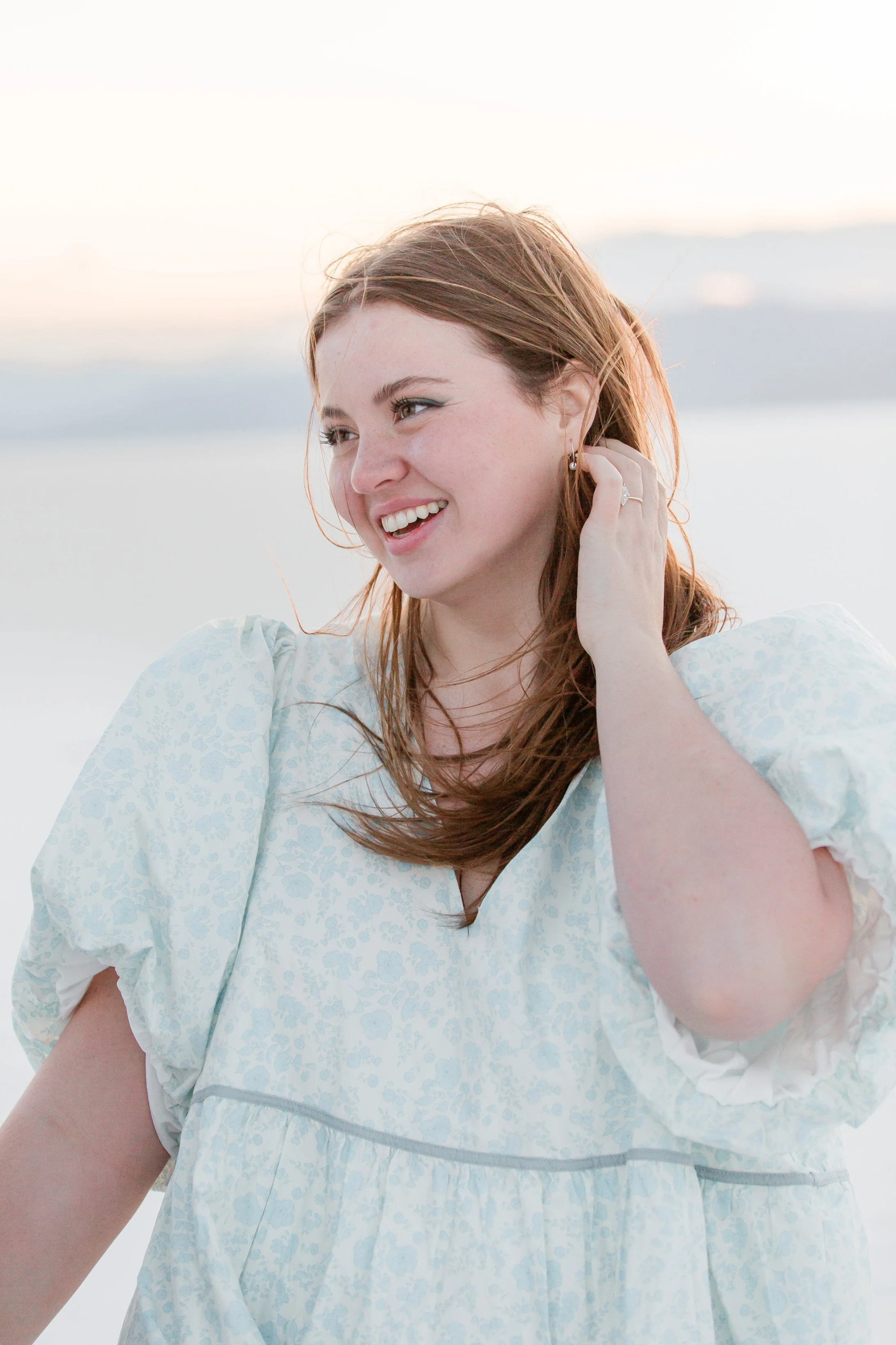 Amanda Lowry Wiberg looking off into distance and smiling