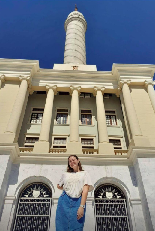 Amanda Lowry Wiberg standing in front of the country monument in the Dominican Republic