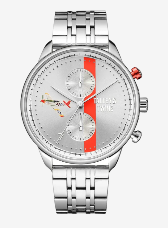 Talley & Twine Officially Licensed Tuskegee Airmen Red Tails™ wristwatch with red accent on the crown, featuring a silver dial with two smaller sub-dials, a red vertical stripe, and a colorful airplane illustration on the left side.
