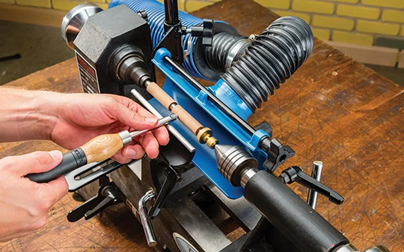 Turning a pen blank on a lathe with carbide tools