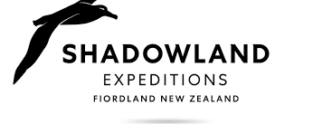 Shadowland Expeditions logo with a stylized bird and text indicating Flordland, New Zealand