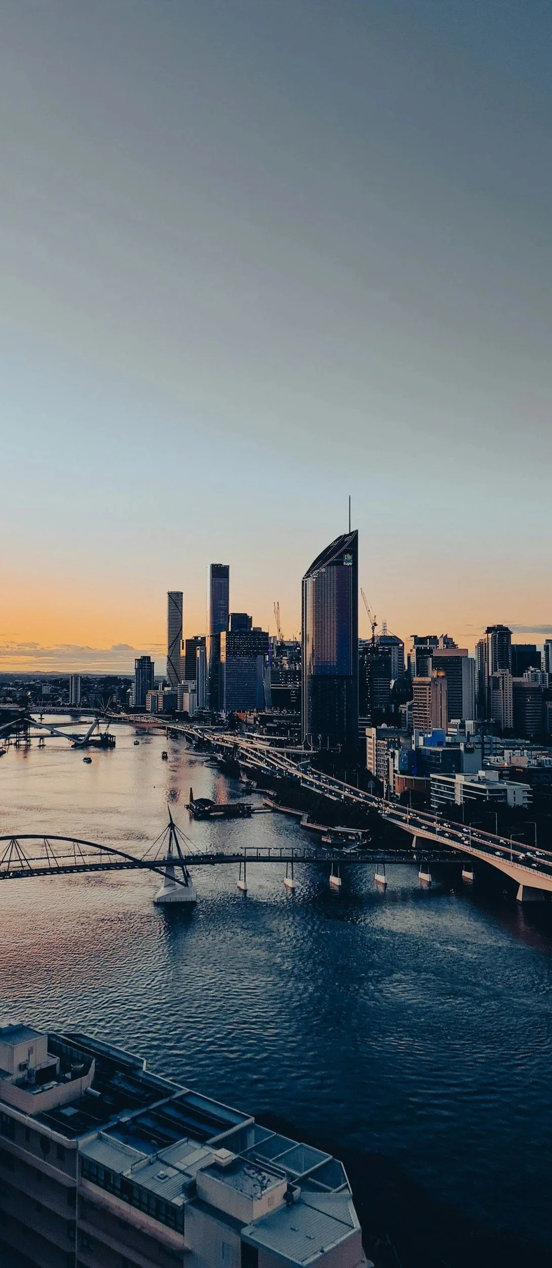 Brisbane River and CBD at dusk, where Altiera works as a commercial buyers agent