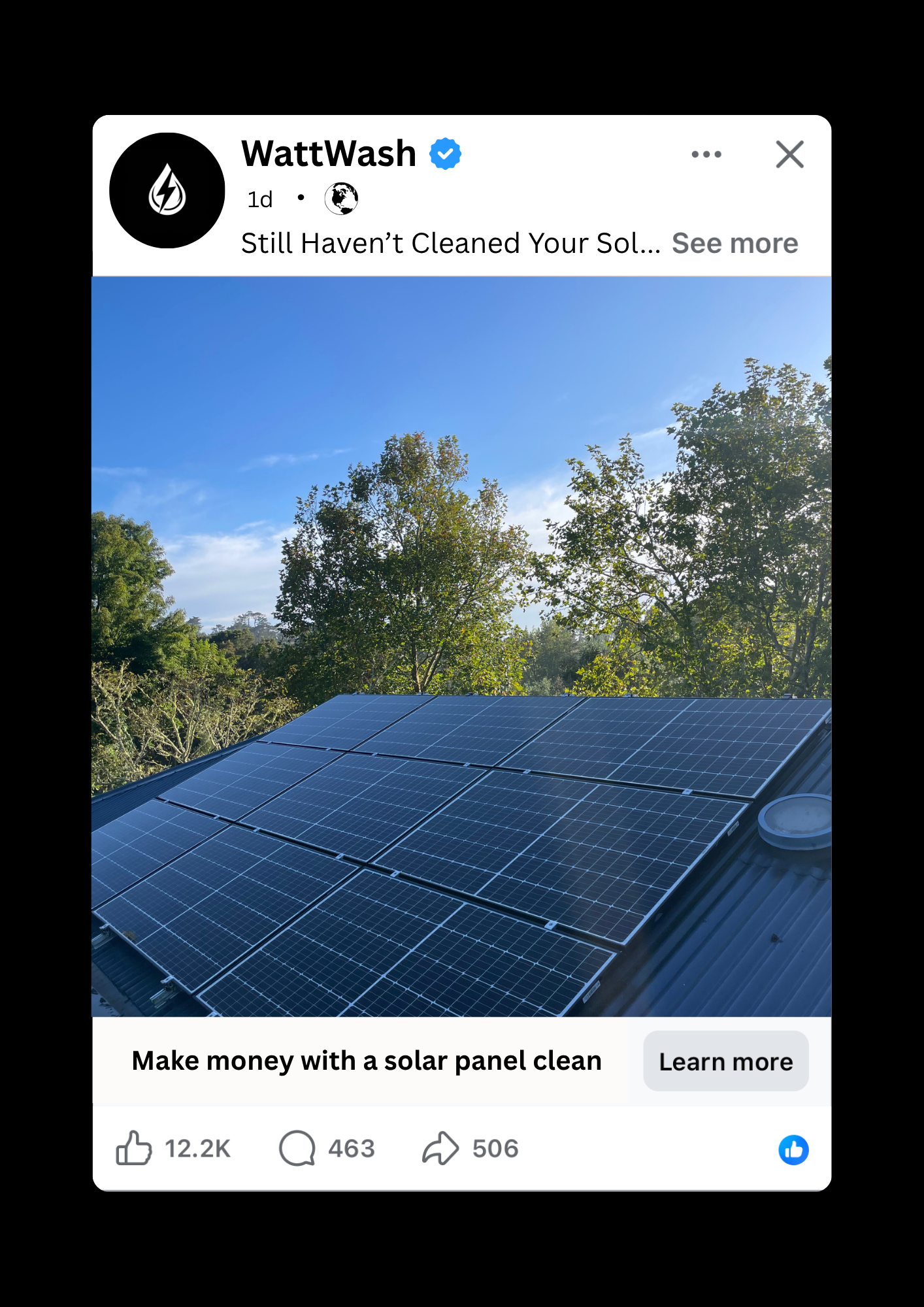 Freshly cleaned Solar panels on a roof with trees and blue sky in the background.