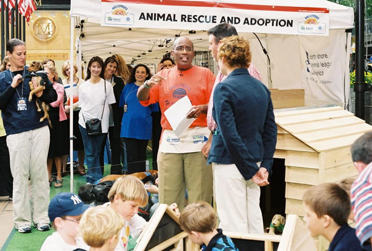 People participating in an animal rescue and adoption event on the Today Show.